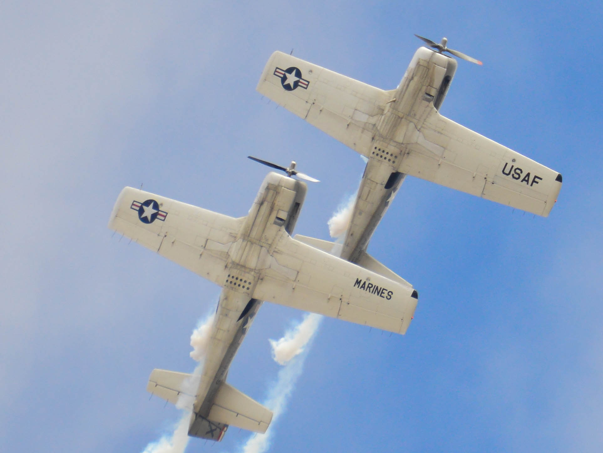 Two T-28s fly a aerobatic routine